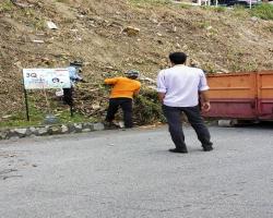 KERJA-KERJA PEMBERSIHAN LERENG BUKIT