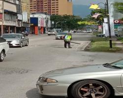 KERJA-KERJA PEMBERSIHAN JALAN JKR