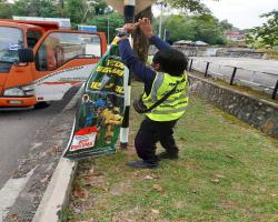 KERJA-KERJA MEMBUKA PAPAN IKLAN/BANTING/"BANNER" HARAM
