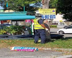 KERJA-KERJA MEMBUKA PAPAN IKLAN/BANTING/"BANNER" HARAM